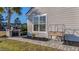 Outdoor kitchen features a built-in grill and a planter box; a brick path adds an element of rustic charm at 115 Bluff Isle Ct, Summerville, SC 29486