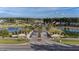 Beautiful community entrance surrounded by two lakes, manicured greenery, and trees offering an inviting welcome at 115 Bluff Isle Ct, Summerville, SC 29486