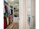 The walk-in closet is spacious and leads into the main bath area at 115 Bluff Isle Ct, Summerville, SC 29486