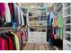 This walk-in closet is a large and features custom shelving and plenty of storage at 115 Bluff Isle Ct, Summerville, SC 29486