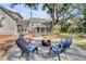 Relaxing backyard area with a fire pit and comfortable seating, perfect for outdoor gatherings at 129 Sparrow Dr, Isle of Palms, SC 29451