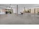 Spacious basement with a concrete floor, support beams, and partially furnished area at 129 Sparrow Dr, Isle of Palms, SC 29451