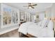 Comfortable bedroom with bright windows, hardwood floors, and classic furnishings at 129 Sparrow Dr, Isle of Palms, SC 29451