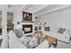 Stylish living room featuring a cozy fireplace, comfortable sofas, and elegant decor for a relaxing atmosphere at 129 Sparrow Dr, Isle of Palms, SC 29451