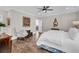 Spacious main bedroom with hardwood flooring, neutral paint, and doorway to ensuite bathroom at 129 Sparrow Dr, Isle of Palms, SC 29451