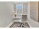 Cozy office nook with a sleek desk, comfortable chair, and a bright window with wood flooring at 129 Sparrow Dr, Isle of Palms, SC 29451