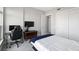 Well-lit bedroom featuring a sleek desk, ergonomic chair and closet for convenient storage at 145 Pier View St # 403, Charleston, SC 29492