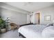 Large bedroom with a ceiling fan, plant, window, and a large bed at 145 Pier View St # 403, Charleston, SC 29492