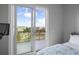 Cozy bedroom with a balcony overlooking the community at 145 Pier View St # 403, Charleston, SC 29492