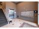Hallway near stairs with elevator, mailbox, bench, and tile floors at 145 Pier View St # 403, Charleston, SC 29492
