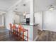 Gourmet kitchen featuring an island with bar stool seating and pendant lights, plus stainless steel appliances at 145 Pier View St # 403, Charleston, SC 29492