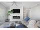 Cozy living room with fireplace, hardwood floors, and comfortable seating at 145 Pier View St # 403, Charleston, SC 29492