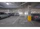 Well-lit parking garage with assigned spots, providing safe and convenient vehicle storage for residents at 145 Pier View St # 403, Charleston, SC 29492