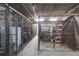 Secure storage unit with chainlink surrounding metal cage and overhead piping at 145 Pier View St # 403, Charleston, SC 29492