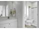 Well-lit bathroom with a sink, a toilet, and a glass-enclosed shower at 1721 Pimlico Blvd, Moncks Corner, SC 29461