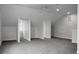 Large bonus room offers versatility and comfort with neutral walls and plush carpeting at 1721 Pimlico Blvd, Moncks Corner, SC 29461
