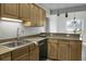 Well-appointed kitchen with stainless sink and ample counter space and cabinet storage at 1721 Pimlico Blvd, Moncks Corner, SC 29461