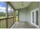 Comfortable screened-in porch offers serene views of the wooded surroundings at 1721 Pimlico Blvd, Moncks Corner, SC 29461