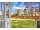 A wide green lawn spans to a red picket fence surrounding the property at 188 Donning Dr, Summerville, SC 29483
