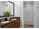 Bathroom with a double sink vanity and a bathtub/shower combo with white tile surround at 188 Donning Dr, Summerville, SC 29483