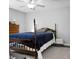 Bedroom with a dark wood frame bed, ceiling fan, and dresser with a lamp at 188 Donning Dr, Summerville, SC 29483
