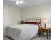 Bedroom with a bed, ceiling fan, night stand, and natural light from a window at 188 Donning Dr, Summerville, SC 29483