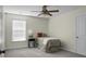 Bedroom featuring neutral tones, a ceiling fan, and a window to allow for plenty of natural light at 188 Donning Dr, Summerville, SC 29483