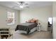 Bedroom offering natural light and a ceiling fan, alongside a dresser and a white-framed mirror at 188 Donning Dr, Summerville, SC 29483