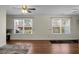 Bonus room featuring hardwood floors, two large windows, and a view to the backyard at 188 Donning Dr, Summerville, SC 29483