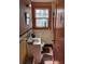Cozy bathroom featuring a classic design with a vintage-style sink, mirror, and tiled walls at 2157 Dorchester Rd, North Charleston, SC 29405