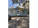 Charming single-story building featuring a blue painted exterior and a well-maintained front yard at 2157 Dorchester Rd, North Charleston, SC 29405