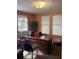 Functional office space with neutral tones, ample lighting, and essential equipment for productivity at 2157 Dorchester Rd, North Charleston, SC 29405
