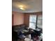 Functional office space with neutral tones, ample lighting, and essential equipment for productivity at 2157 Dorchester Rd, North Charleston, SC 29405
