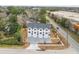 Wide aerial view of townhomes showing proximity to the main road and surrounding houses at 2191 Helm Ave, North Charleston, SC 29405