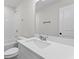 Bathroom with a single sink, toilet, shower and bath featuring white subway tile at 2191 Helm Ave, North Charleston, SC 29405