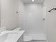 Clean bathroom with a single sink, toilet, and a shower with white subway tile at 2191 Helm Ave, North Charleston, SC 29405