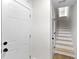Entryway featuring a closet, stairs leading to the second level, and neutral decor at 2191 Helm Ave, North Charleston, SC 29405