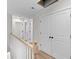 Second story hallway with storage closet and overhead light at 2191 Helm Ave, North Charleston, SC 29405