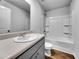 Clean bathroom with a single sink, shower-tub combination, and gray accents at 246 Spencer Cir, Summerville, SC 29485