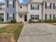 Charming multi-colored townhome with black shutters and a concrete driveway at 246 Spencer Cir, Summerville, SC 29485