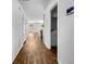 A hallway with wood floors leads to an open space at 246 Spencer Cir, Summerville, SC 29485