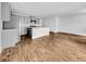 A brightly lit kitchen with gray cabinetry, stainless steel appliances, and hardwood floors at 246 Spencer Cir, Summerville, SC 29485