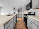 Modern kitchen with stainless steel appliances and ample counter space at 246 Spencer Cir, Summerville, SC 29485