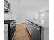 Updated kitchen features stainless appliances and a large island with sink at 246 Spencer Cir, Summerville, SC 29485