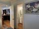 Well-lit bedroom with a comfortable bed and view into a nearby bathroom at 280 Driftwood Ln, Edisto Beach, SC 29438