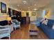 Comfortable living room featuring hardwood floors, ceiling fan and an open floor plan at 280 Driftwood Ln, Edisto Beach, SC 29438