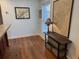 Stylish living space with a lamp on a small wooden table with open window at 280 Driftwood Ln, Edisto Beach, SC 29438