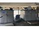Exterior storage units and kayak under a home offer great organization at 280 Driftwood Ln, Edisto Beach, SC 29438
