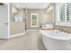 Bright bathroom featuring a soaking tub, glass shower, and modern fixtures for a relaxing experience at 331 Weston Hall Dr, Summerville, SC 29483