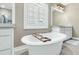 Bright bathroom featuring a soaking tub, and modern fixtures at 331 Weston Hall Dr, Summerville, SC 29483